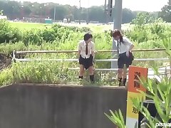 In some tall grass, these two school girls are a bit lost and they have to piss. Thinking no one will see, they squat over a bridge and pee. With PissJapanTV.com picking up their scent, we film then go in for a look-see at their dirty tissues.